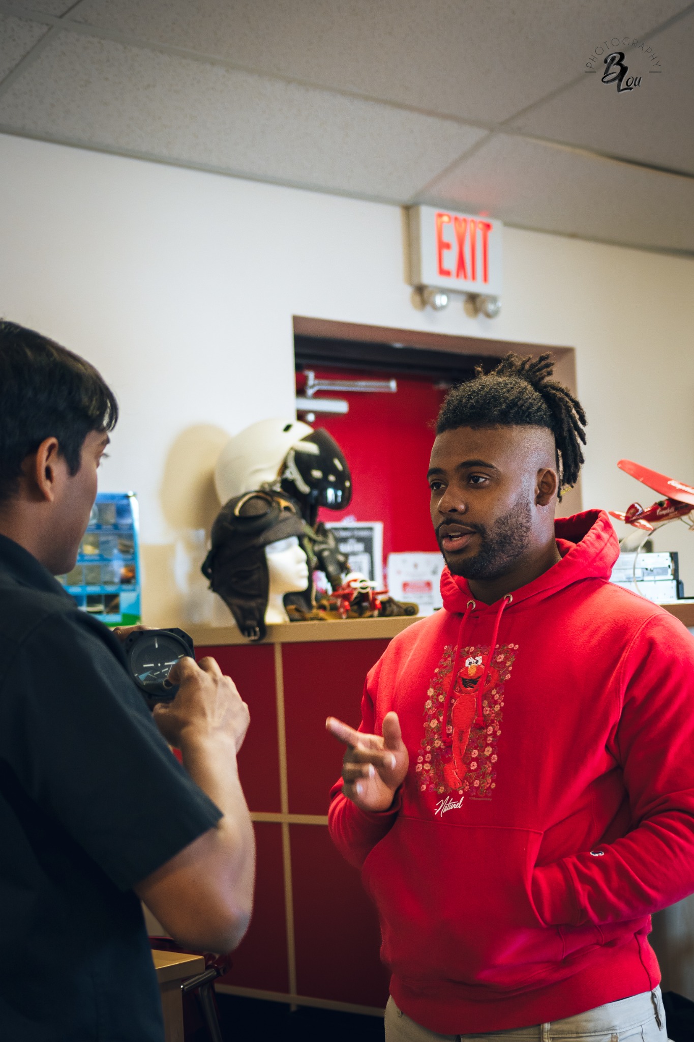 Instructor speaks with another instructor before a flight in Santa Teresa, New Mexico